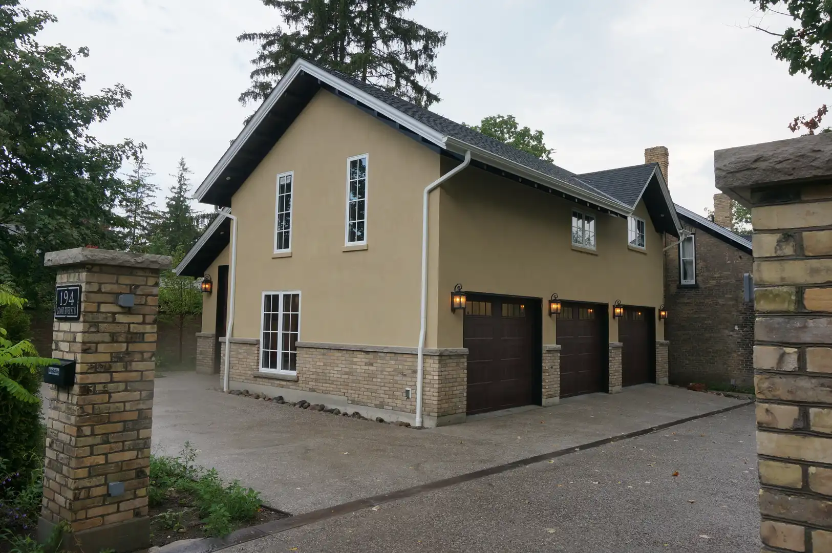 Triple car garage with another door in the back